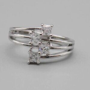 Sterling Silver Quadriband Elevator 4 Stone CZ Ring (size 8)